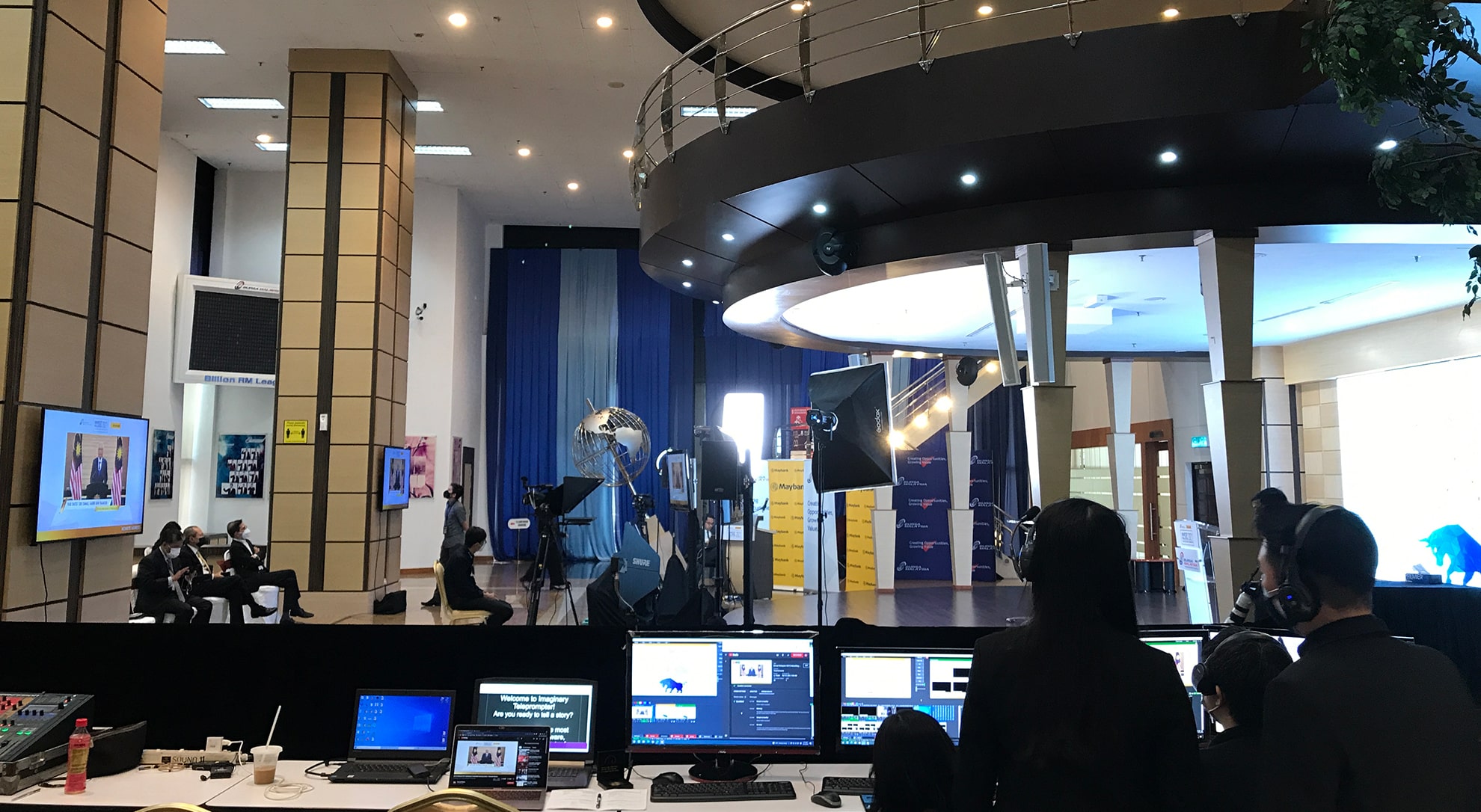 Event production team managing hybrid event audiovisual systems and live streaming in Malaysia.